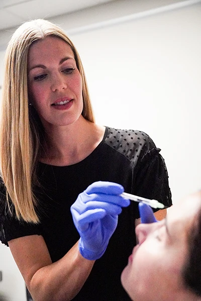 Dr. Lynn Peterson using botox for headache treatment